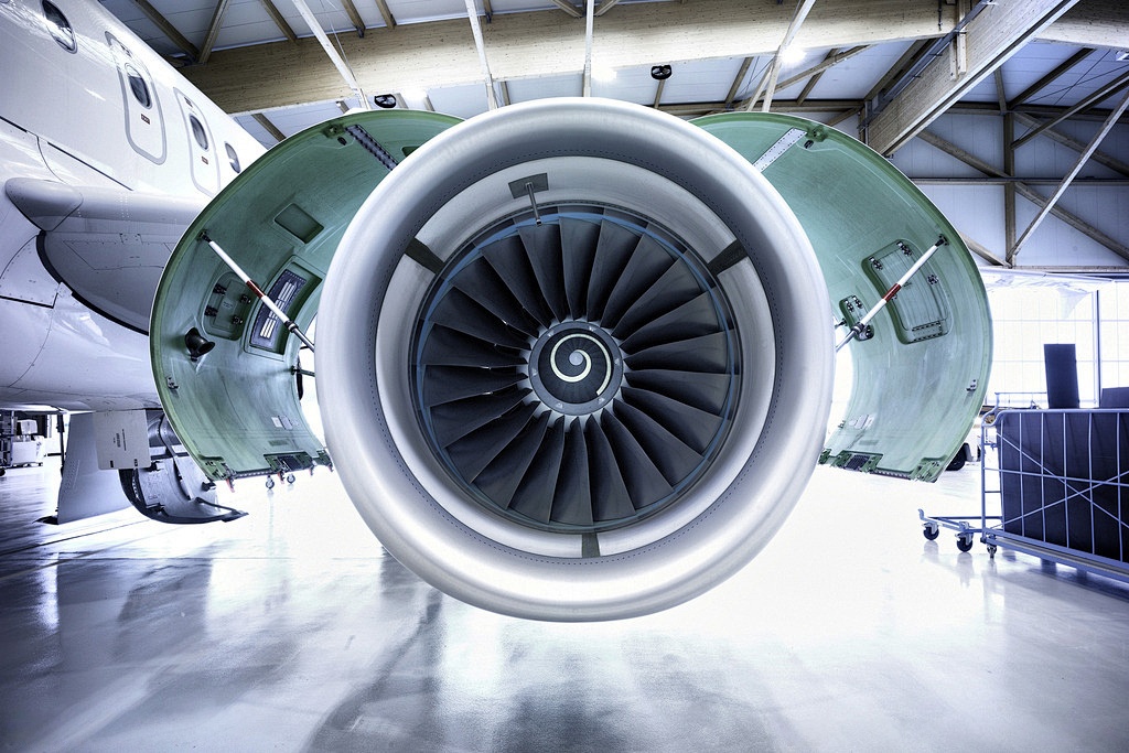 What are the advantages of titanium forging in producing large components?